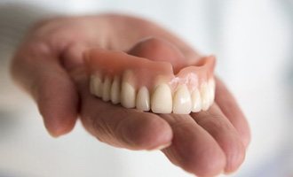 a closeup of full dentures