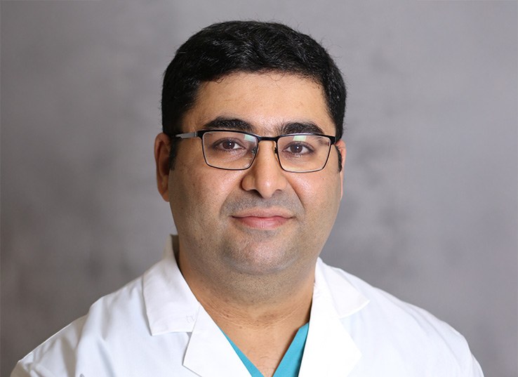 smiling Dr. Abulfaz Isayev, DMD, PhD