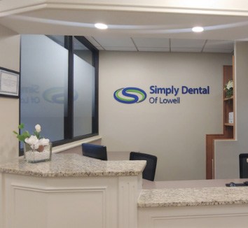 photo of dentist with patient