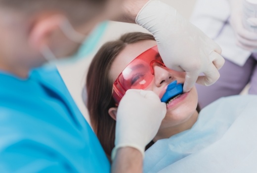 Dental patient receiving fluoride treatment