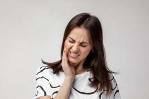 a patient suffering from a toothache 