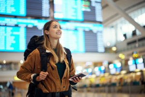 a person walking through an airport 